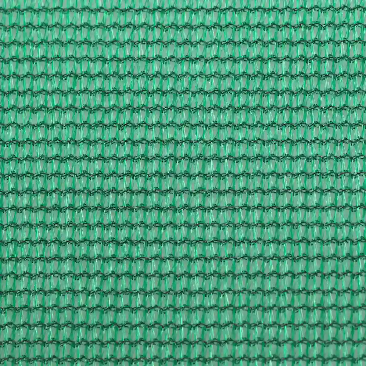 Nahaufnahme eines grünen, grobmaschigen Gewebe