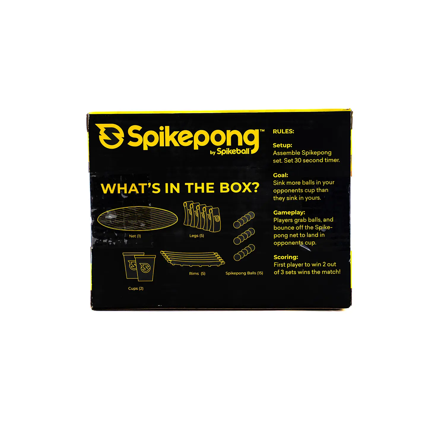Verpackung des Spikepong Spiels von Spikeball in Schwarz‑Gelb mit Aufdruck „What’s in the Box?“ und Spielregeln – zeigt Netz, Beine, Becher, Ringe und Bälle als Inhalt